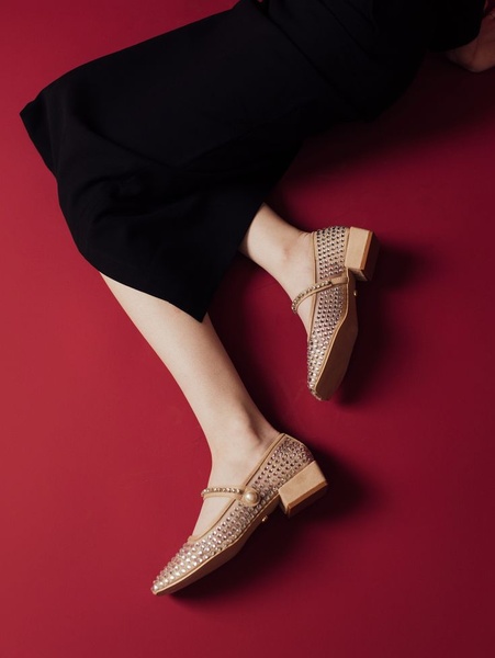 studded flats, pointed toe flats, embellished flats, dress flats, ballet flats, women's flats, flat shoes, product launch, editorial, luxurious, bold, red, gold